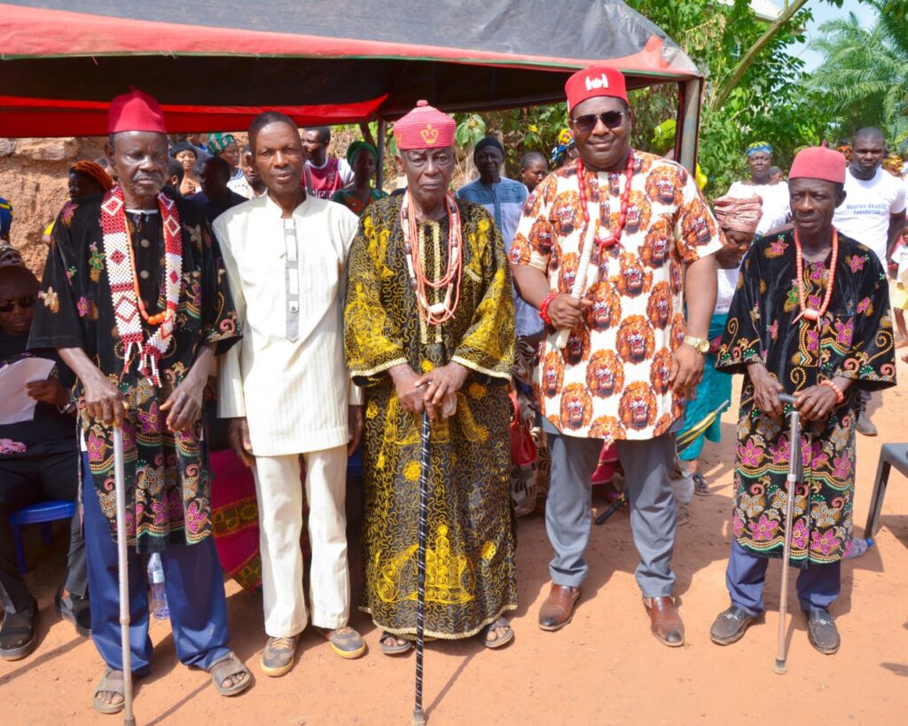 Chief Maurice Emeka Akueme Posing With HRH Igwe S. I. Amah and His Council of Elders After Conferment of Title