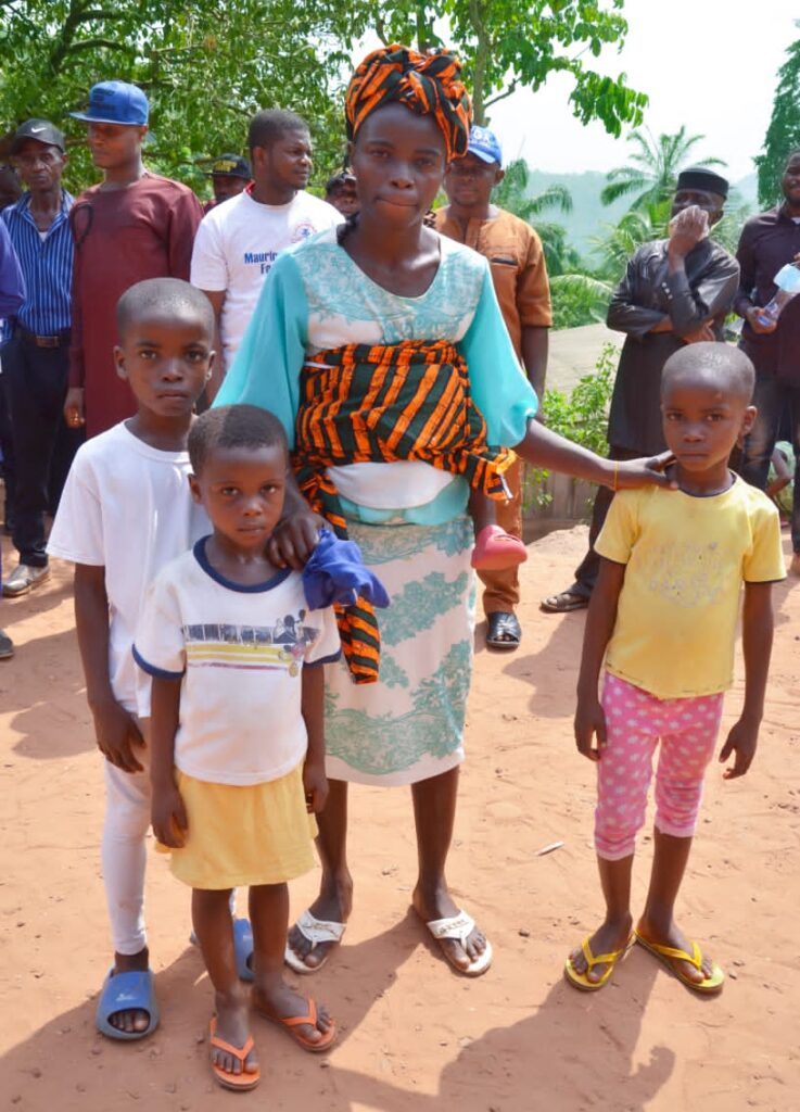 Mrs Blessing Chukwuma the Widow Who Was Gifted A Bungalow By Chief Maurice Emeka Akueme Poses With Some of Her Children